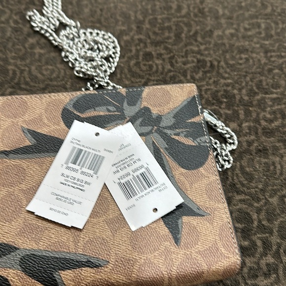 Coach Slim Crossbody Bag In Signature Canvas With Bow Print - Picture 10 of 10